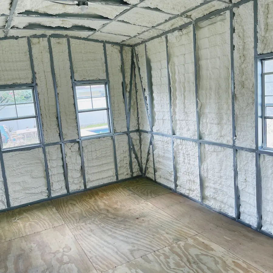 Closed-cell spray foam insulation applied to wall cavities in a residential project in Clarendon Hills
